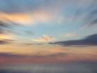 Zoom-blur image of sunset sky. Art Print